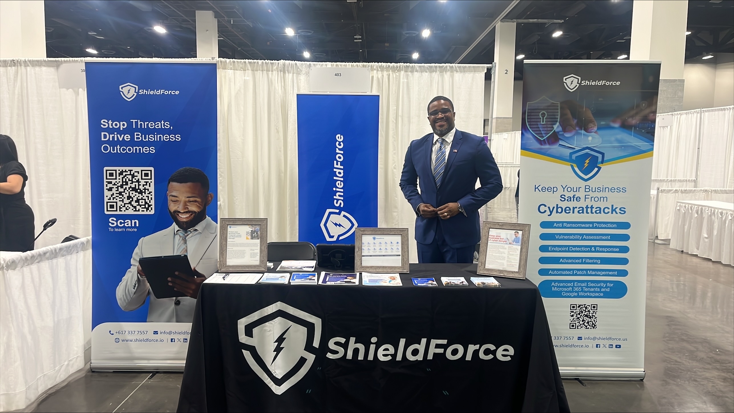 ShieldForce Team Engaging with Attendees