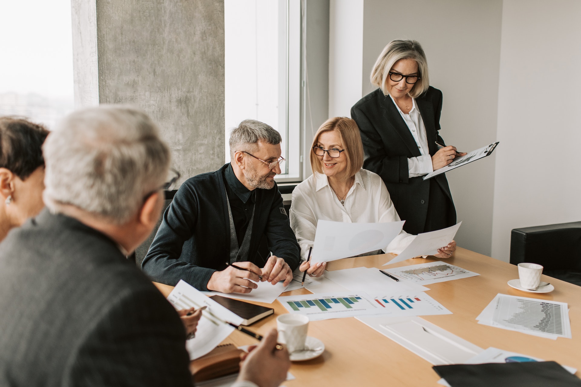 Office workers deliberating