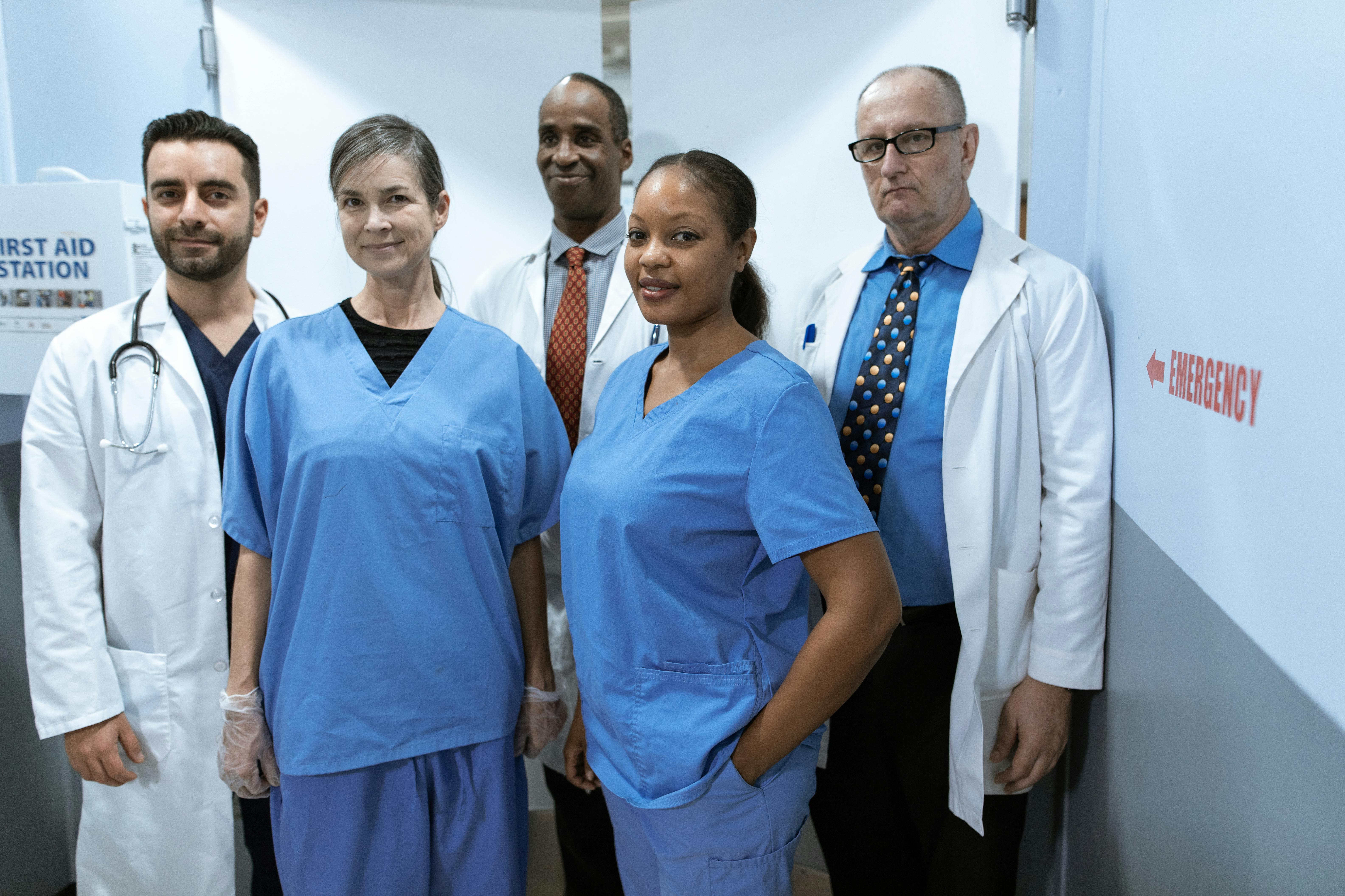 A medical team together in a pose